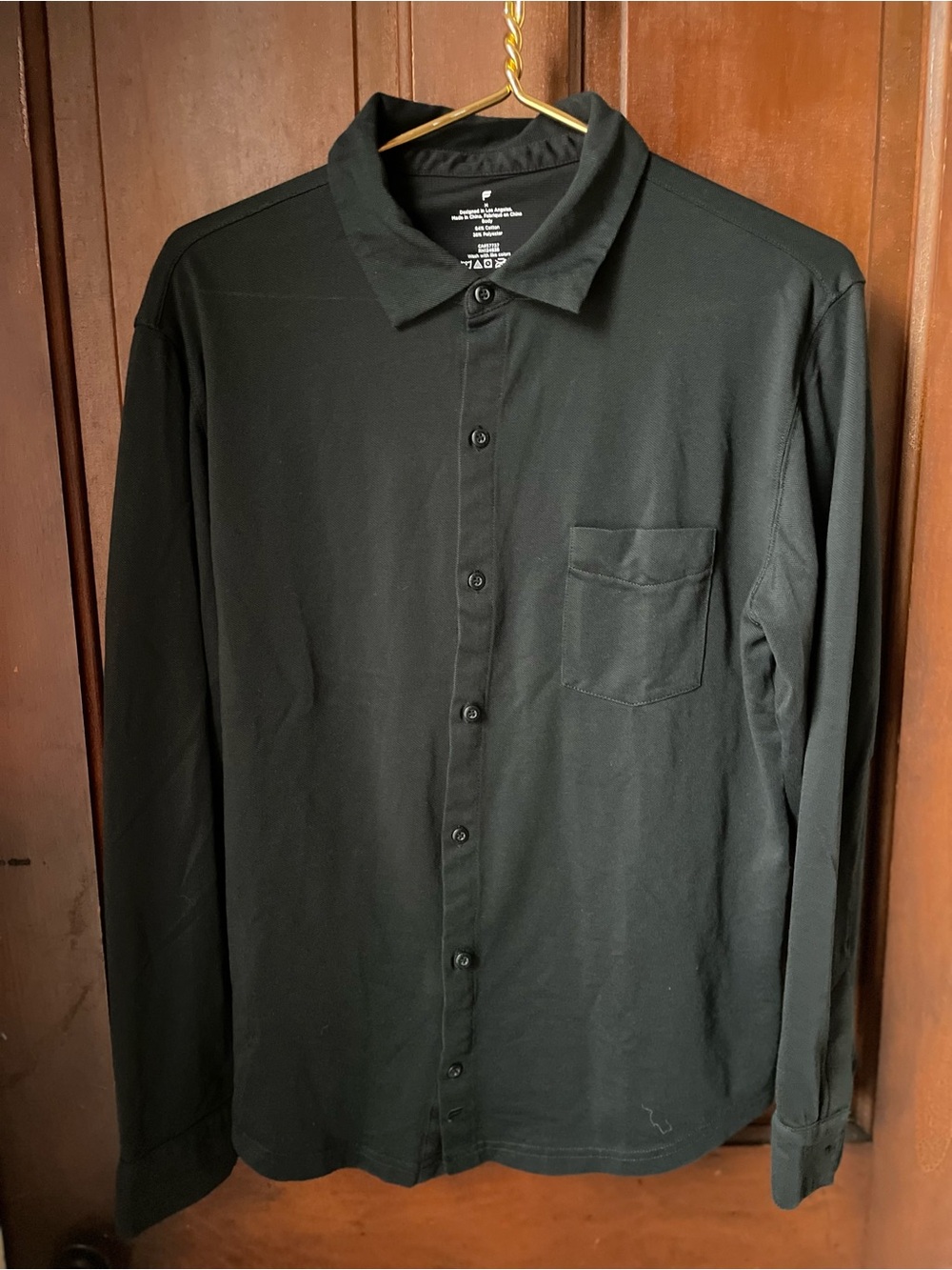 Fabletics men's medium long sleeve black button down shirt